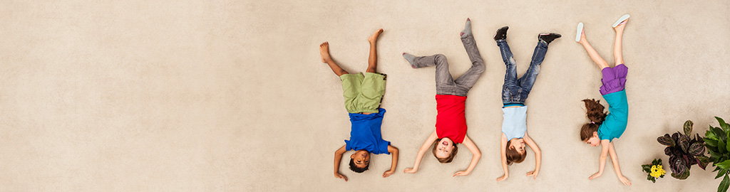 Children posing upside down