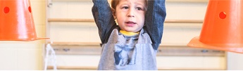 mobile Child showing his strength