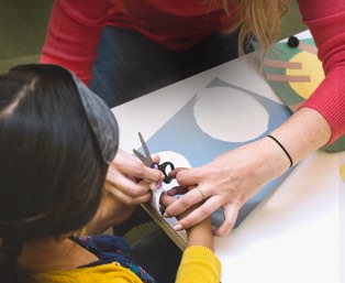 Child working on creative art