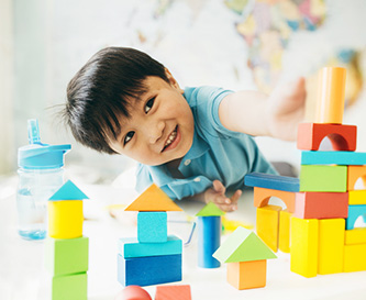 Child playing with blocks