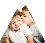 Two children snuggling