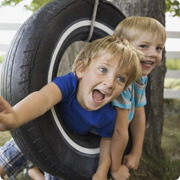 Children in a tire swing